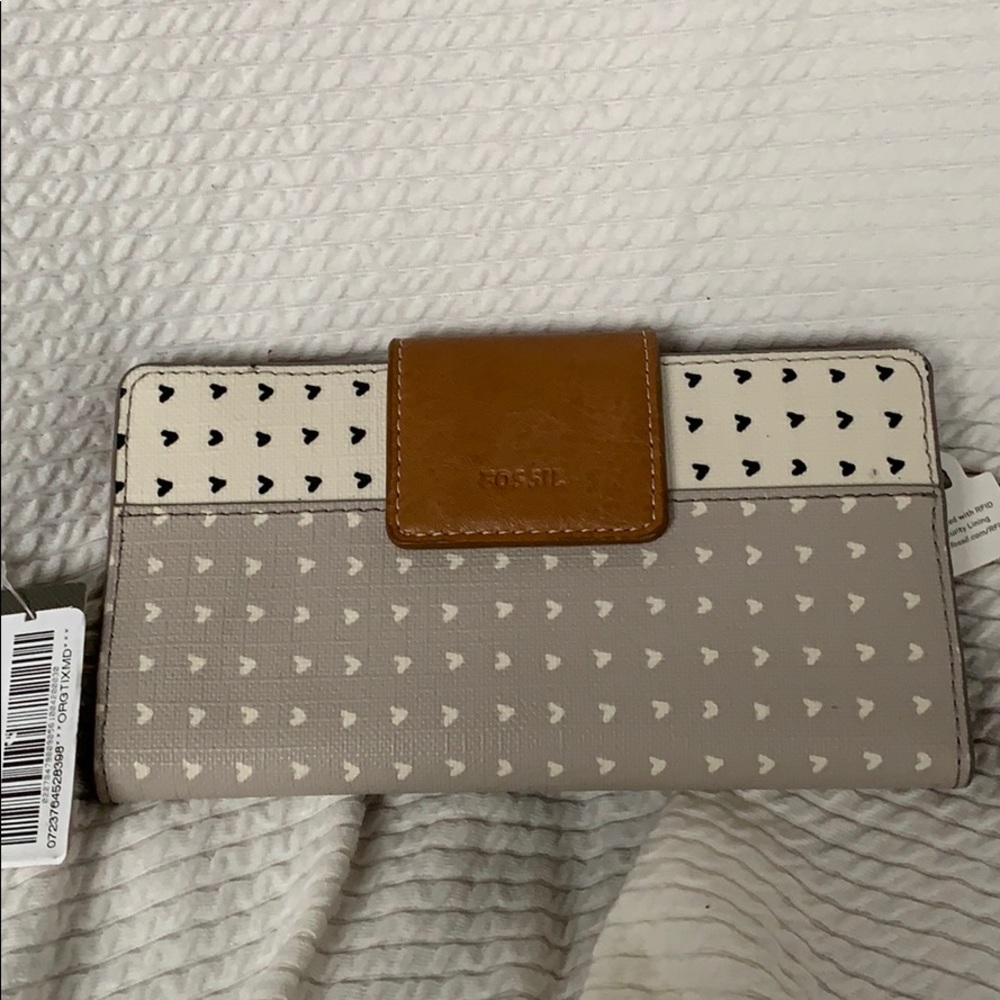 Fossil textured leather heart clutch